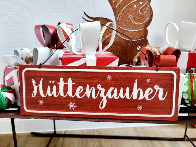 Weihnachtliches Hängeschild "Hüttenzauber" aus Metall 30cm breit